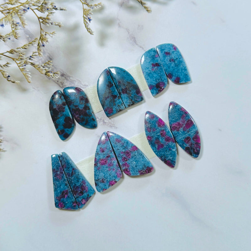 Large Deep Blue Mixed Ruby in Kyanite, Set of 12 Background
